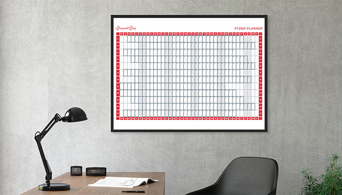 Grey and Grey whiteboard wall planner on office wall