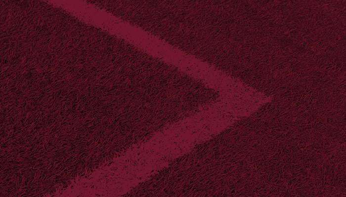 Maroon field showcasing the power of colour in branding